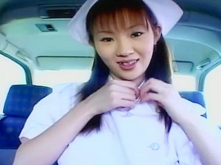 Sexy Nippon nurse in uniform sucking big dick in the car